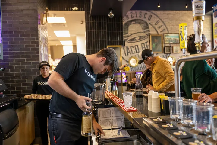 Bartender working during a Taco Bell Cantina grand opening event