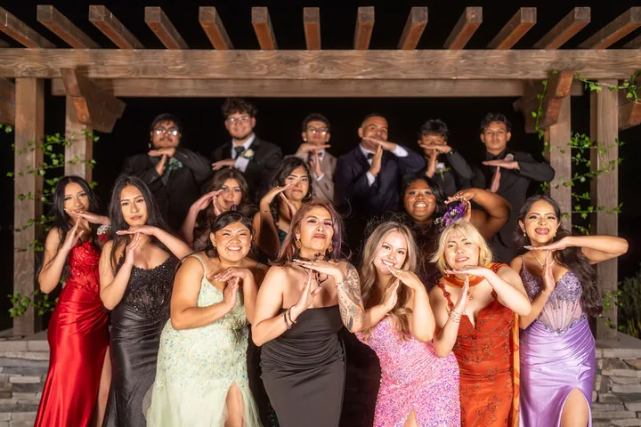 Cristo Rey students celebrating together in formalwear at prom