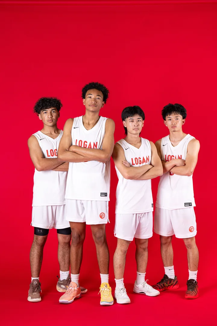 Four James Logan volleyball athletes against a vivid red backdrop